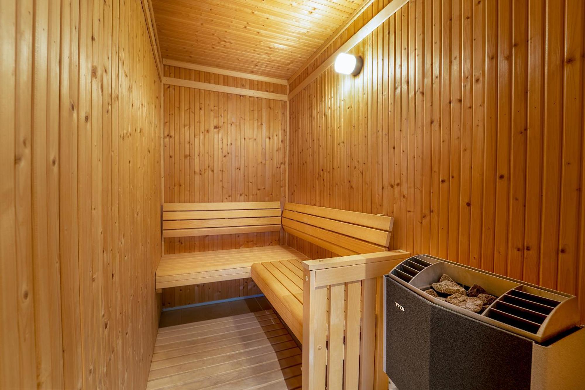 Grand Hyatt Doha Hotel & Villas Esterno foto A modern Finnish sauna